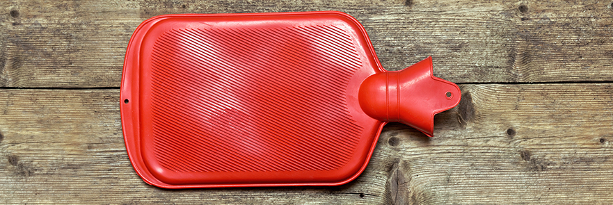 Hot water bottle used for heat therapy.